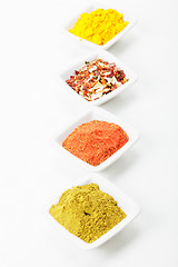 Image showing Different spices in a row