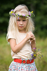 Image showing girl in wild flowers wreath