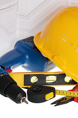 Image showing Tools and helmet of the builder, it is isolated on white