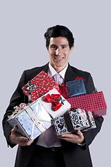 Image showing Businessman with a gift package