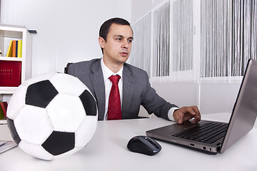 Image showing Soccer manager at the office