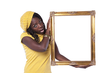 Image showing African woman holding a picture frame