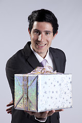 Image showing Businessman with a gift package