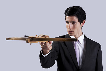 Image showing Businessman aiming with a Crossbow