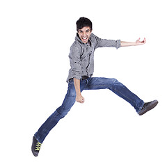 Image showing Happy young man jump