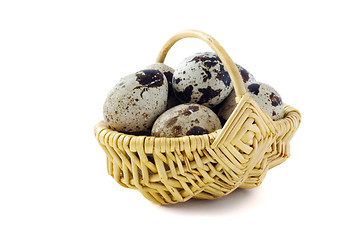 Image showing Has sung eggs in a basket