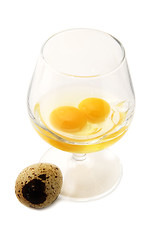 Image showing Two yolks in a glass also has sung an egg