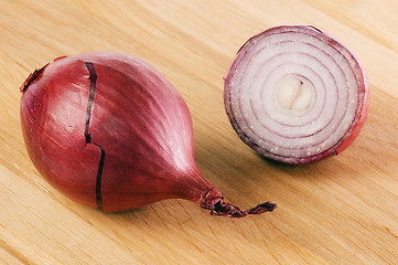 Image showing Bulb on a wooden kitchen board