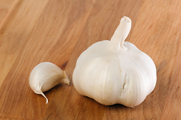 Image showing garlic on a wooden kitchen board