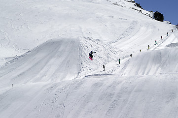 Image showing Snowboard jumping