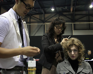 Image showing Korean stylists prepare a Russian model for the runway