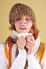Image showing cold girl sneezes 