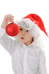 Image showing child in a hat santa claus