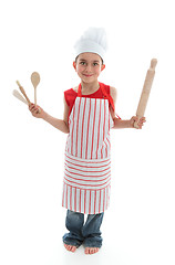 Image showing Little chef holding kitchen utensils