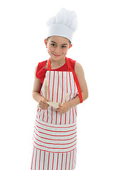 Image showing Smiling chef holding kitchen utensils