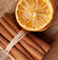 Image showing Cinnamon and dried Orange