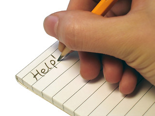 Image showing Notebook, someone writing 'Help!'