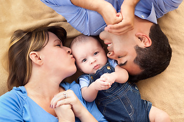 Image showing Mixed Race Family Playing on the Blanket