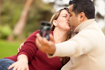 Image showing Attractive Mixed Race Couple Taking Self Portraits