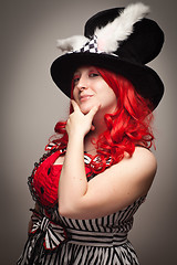 Image showing Attractive Red Haired Woman Wearing Bunny Ear Hat