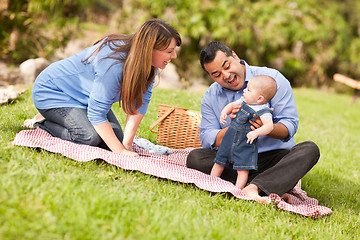 Image showing Happy Mixed Race Family Playing In The Park