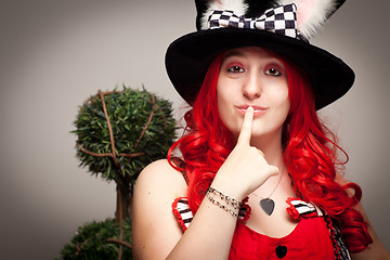 Image showing Attractive Red Haired Woman Wearing Bunny Ear Hat
