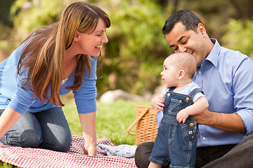 Image showing Happy Mixed Race Family Playing In The Park