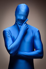 Image showing Man Wearing Full Blue Nylon Bodysuite