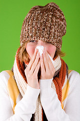 Image showing sneezing woman with handkerchief 