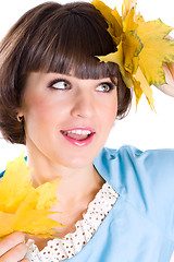 Image showing woman with yellow leaves