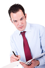 Image showing Young Business Man, writing 