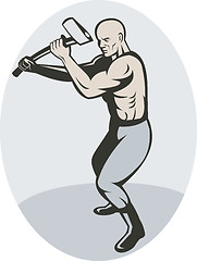 Image showing Man about to swing an ax