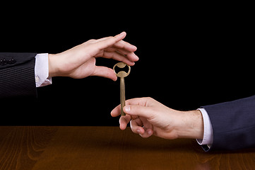 Image showing Giving a key