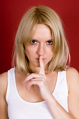 Image showing  woman with finger on lips