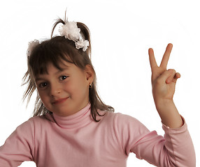 Image showing Young girl show v-sign