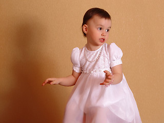 Image showing Girl in a pink dress