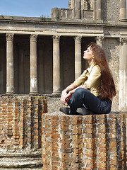 Image showing Young woman looking into the light