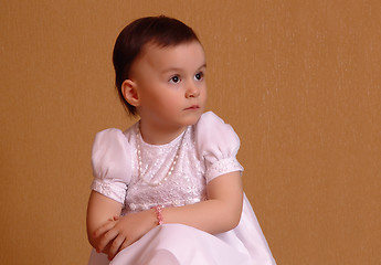 Image showing Girl in a pink dress