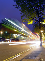 Image showing Red bus arriving