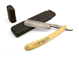 Image showing Old german razor blade and leather case