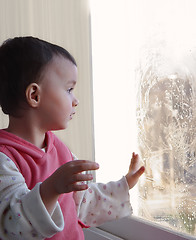 Image showing Girl and the window