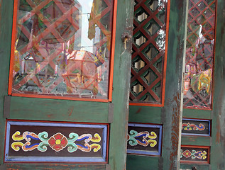 Image showing Temple doors with lanterns reflected in the glass