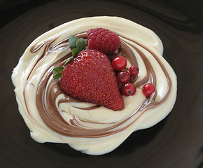 Image showing chocolate swirl with raspberry