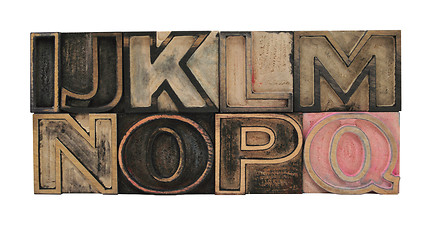 Image showing outline letters in wood I - Q