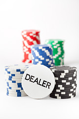 Image showing Poker chips and dealer button