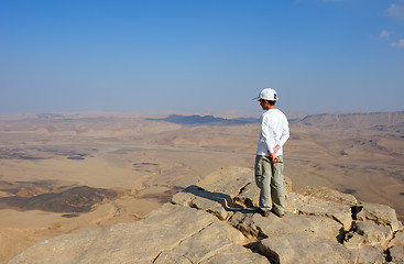 Image showing A boy near the cliff