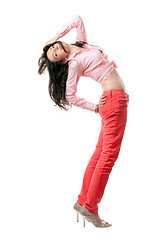 Image showing Pretty sexy young brunette in red jeans