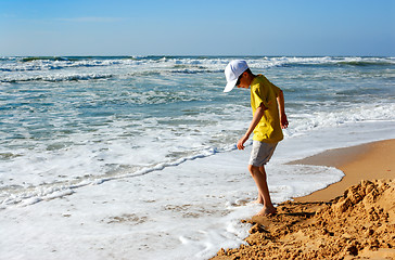 Image showing The boy and the sea