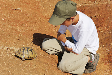 Image showing Boy and Turtle 