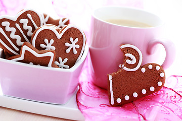 Image showing cup of coffee with cookies